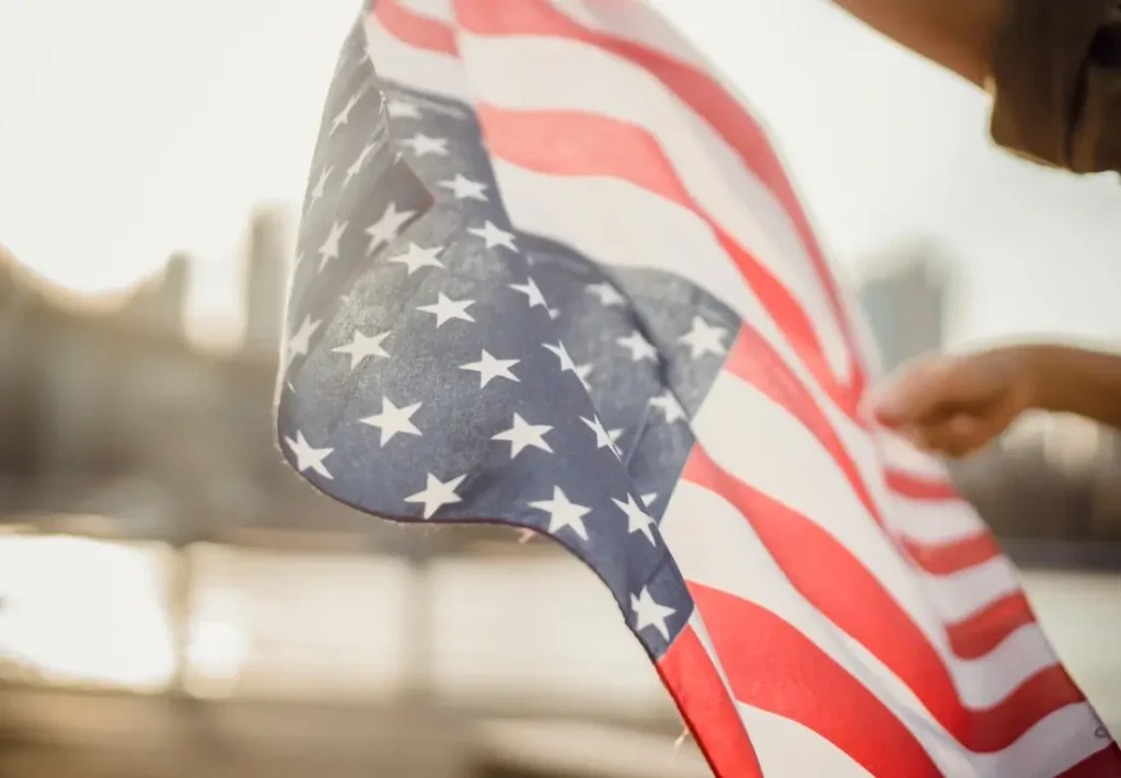 waving American flag symbolizing immigration